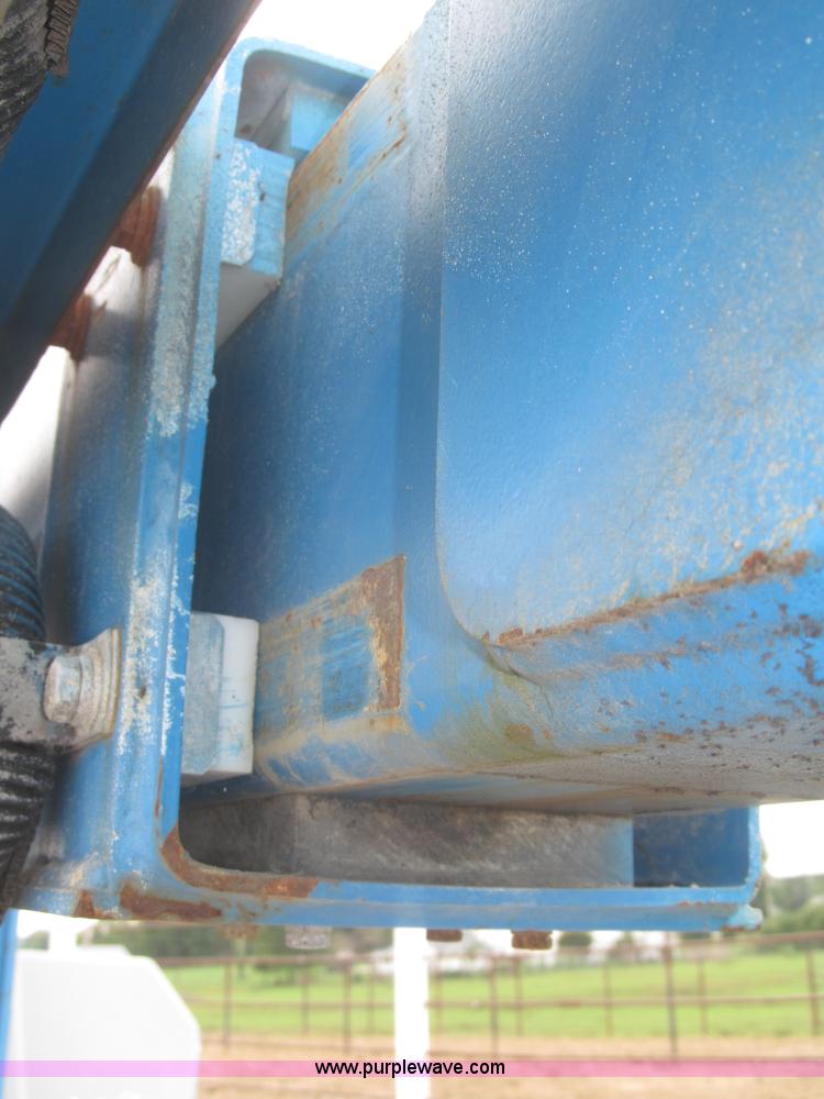 image for item F7076 1999 Genie Z34/22N narrow electric boom lift