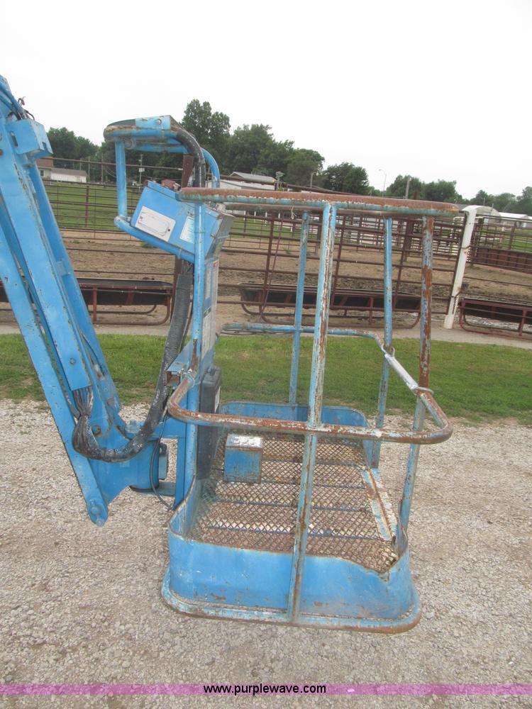image for item F7076 1999 Genie Z34/22N narrow electric boom lift