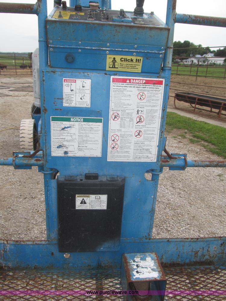 image for item F7076 1999 Genie Z34/22N narrow electric boom lift