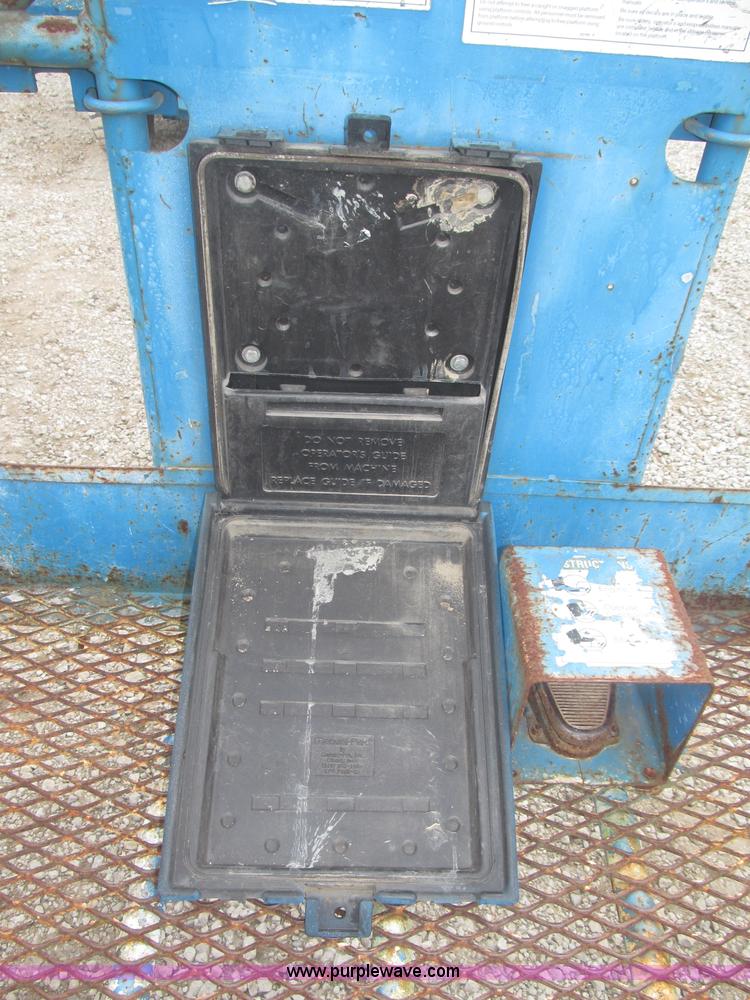 image for item F7076 1999 Genie Z34/22N narrow electric boom lift