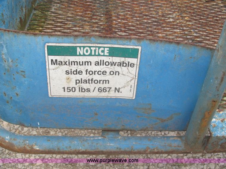 image for item F7076 1999 Genie Z34/22N narrow electric boom lift