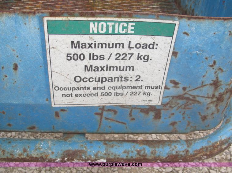 image for item F7076 1999 Genie Z34/22N narrow electric boom lift