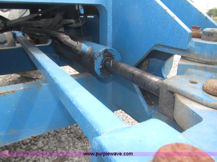 image for item F7076 1999 Genie Z34/22N narrow electric boom lift