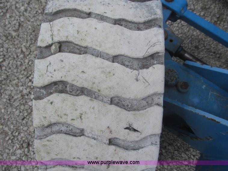 image for item F7076 1999 Genie Z34/22N narrow electric boom lift