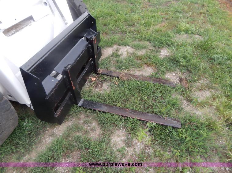 image for item G3329 Bobcat 980 skid steer