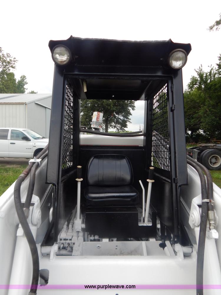 image for item G3329 Bobcat 980 skid steer