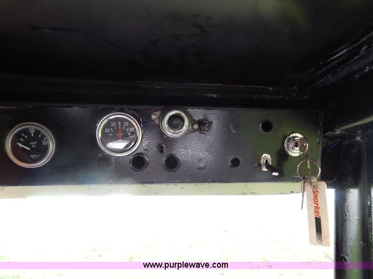 image for item G3329 Bobcat 980 skid steer