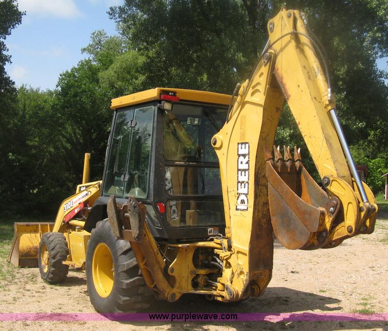 image for item H6466 1999 John Deere 310E backhoe