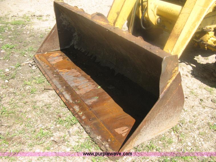 image for item H6466 1999 John Deere 310E backhoe