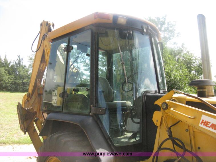 image for item H6466 1999 John Deere 310E backhoe