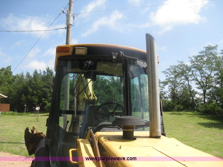 image for item H6466 1999 John Deere 310E backhoe