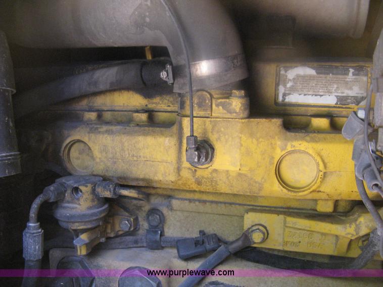 image for item H6466 1999 John Deere 310E backhoe