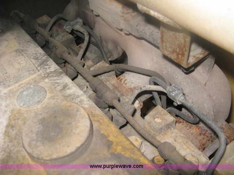 image for item H6466 1999 John Deere 310E backhoe