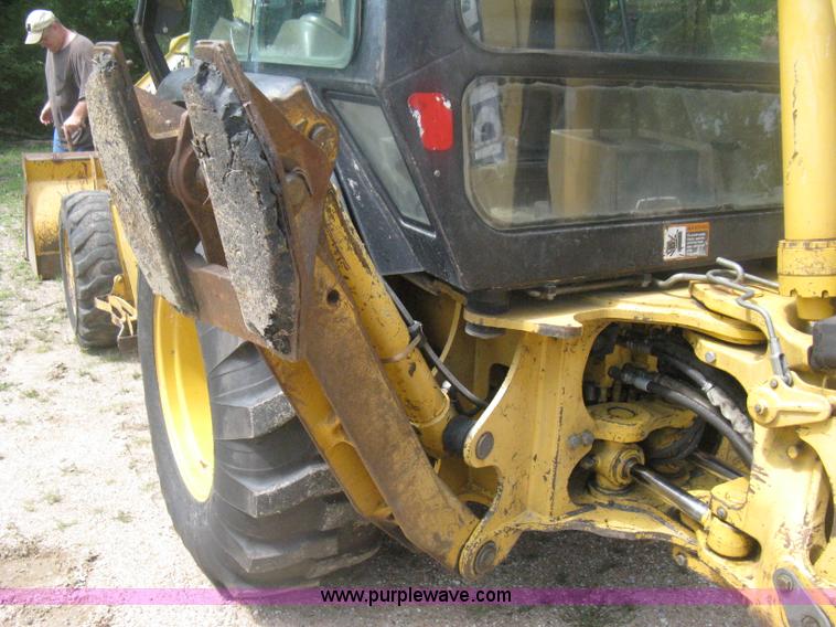 image for item H6466 1999 John Deere 310E backhoe