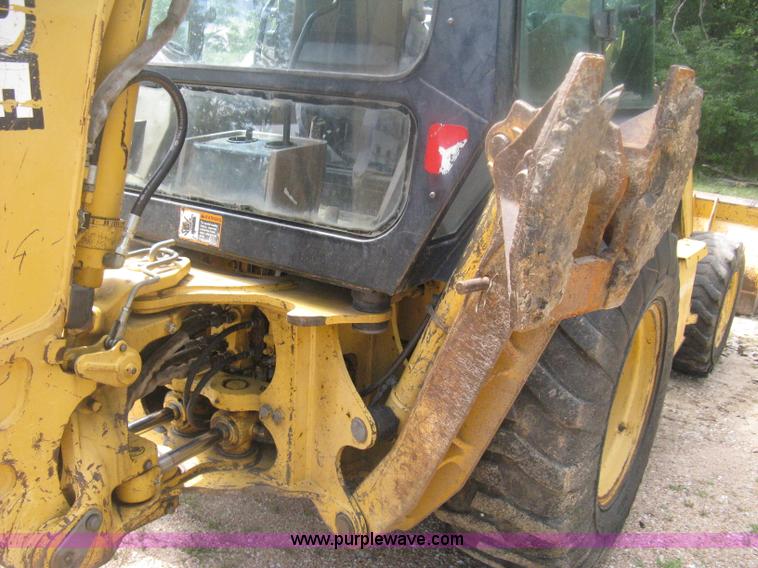 image for item H6466 1999 John Deere 310E backhoe