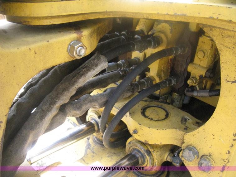 image for item H6466 1999 John Deere 310E backhoe