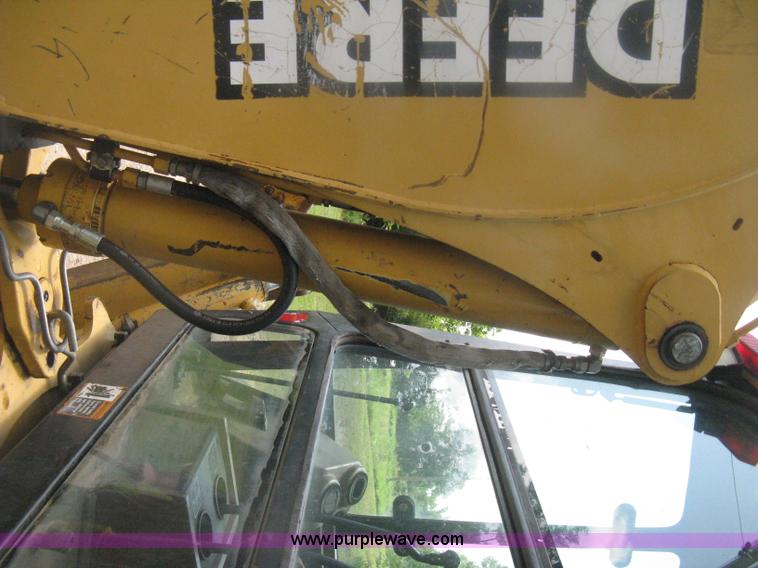 image for item H6466 1999 John Deere 310E backhoe