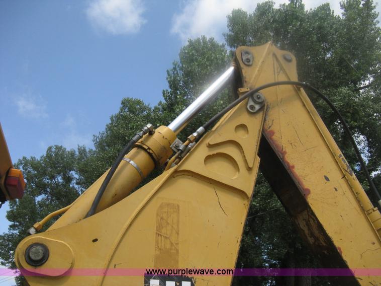image for item H6466 1999 John Deere 310E backhoe