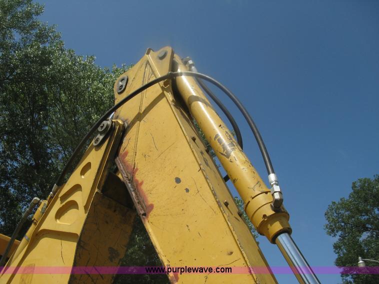 image for item H6466 1999 John Deere 310E backhoe