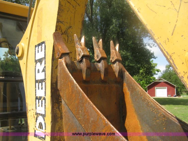 image for item H6466 1999 John Deere 310E backhoe