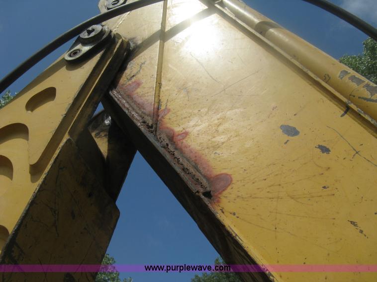 image for item H6466 1999 John Deere 310E backhoe