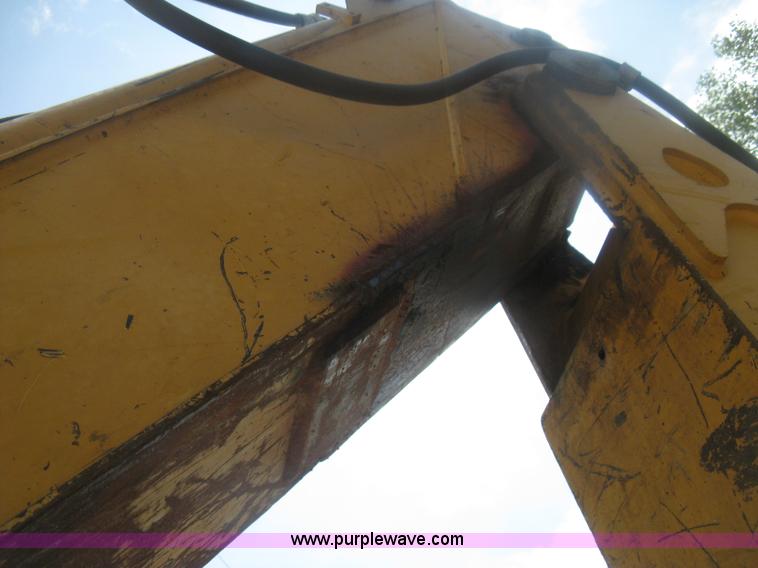 image for item H6466 1999 John Deere 310E backhoe