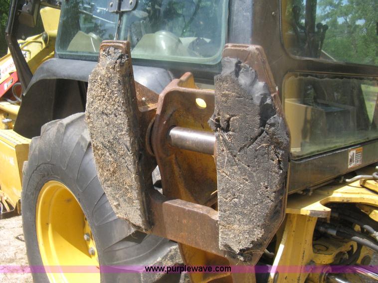 image for item H6466 1999 John Deere 310E backhoe