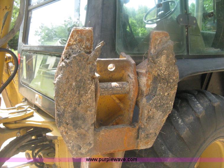 image for item H6466 1999 John Deere 310E backhoe