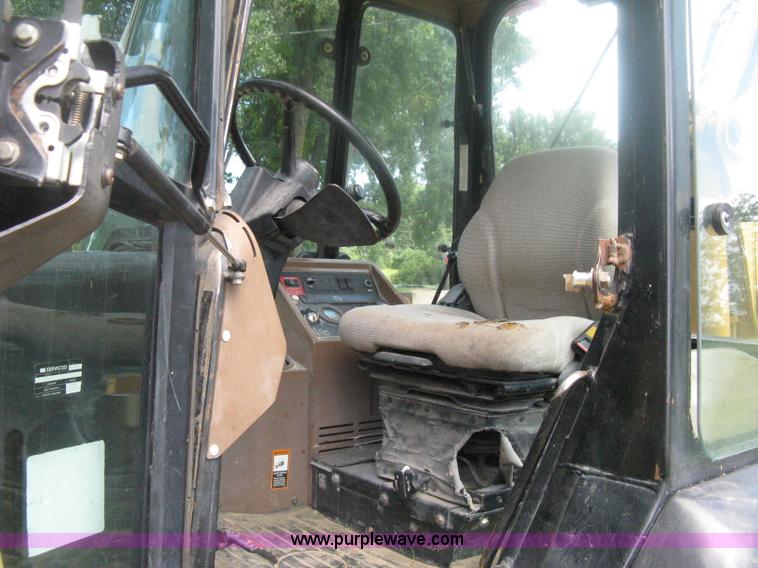 image for item H6466 1999 John Deere 310E backhoe
