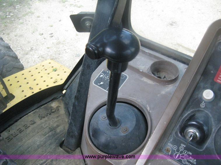 image for item H6466 1999 John Deere 310E backhoe