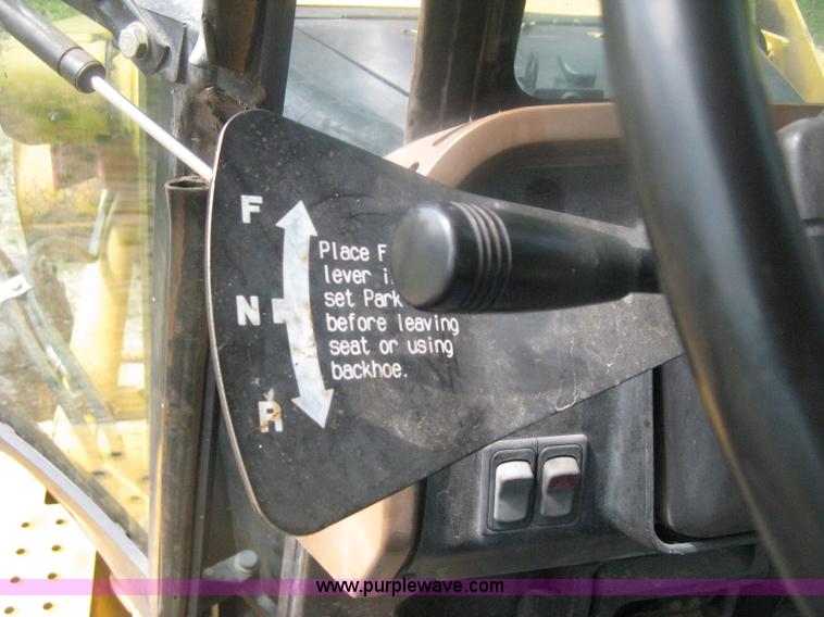 image for item H6466 1999 John Deere 310E backhoe