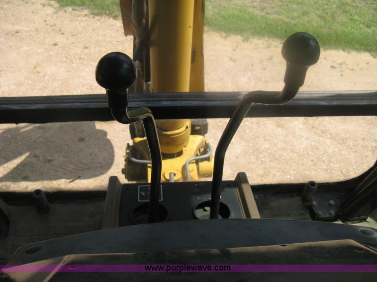 image for item H6466 1999 John Deere 310E backhoe