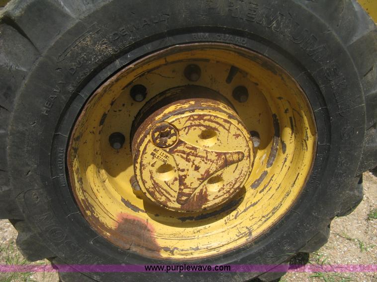 image for item H6466 1999 John Deere 310E backhoe