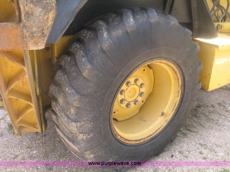 image for item H6466 1999 John Deere 310E backhoe