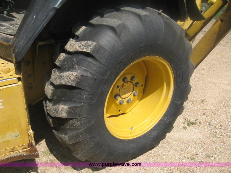 image for item H6466 1999 John Deere 310E backhoe