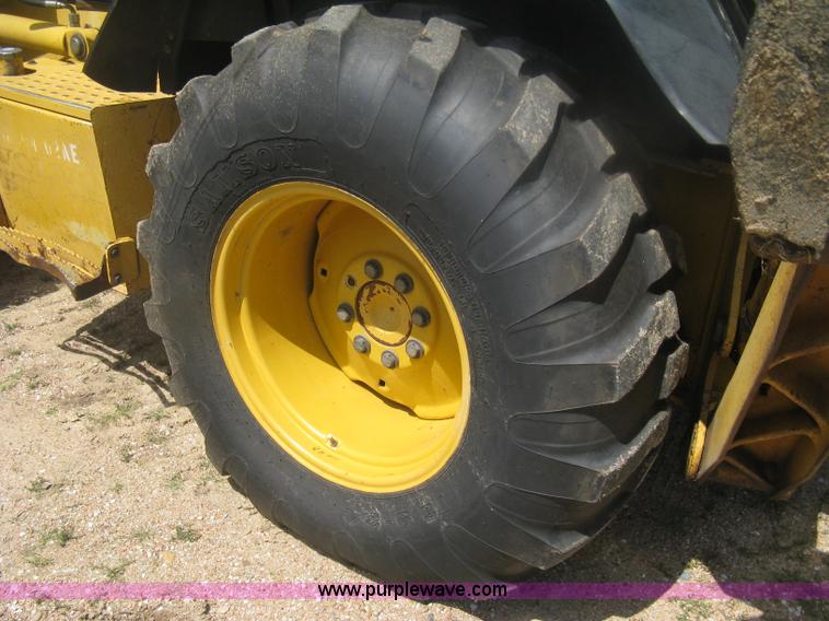 image for item H6466 1999 John Deere 310E backhoe