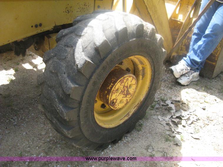 image for item H6466 1999 John Deere 310E backhoe