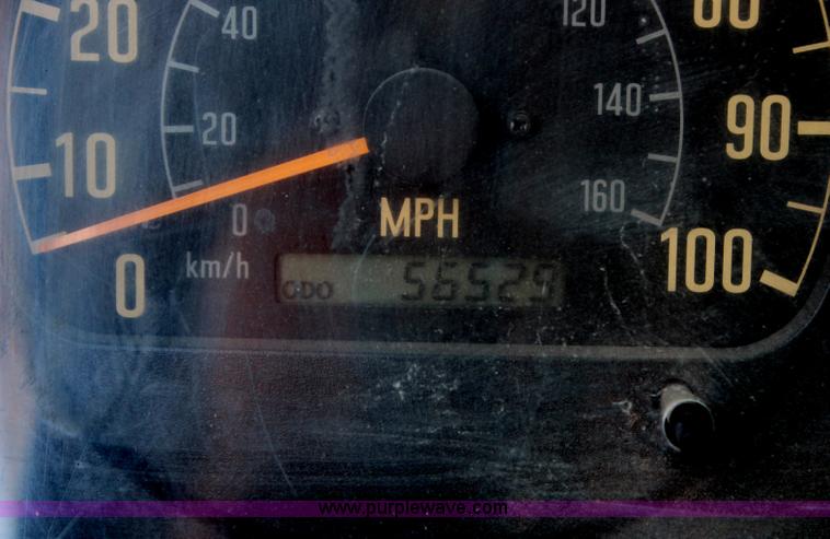 image for item H6735 2000 GMC 4500 sweeper truck