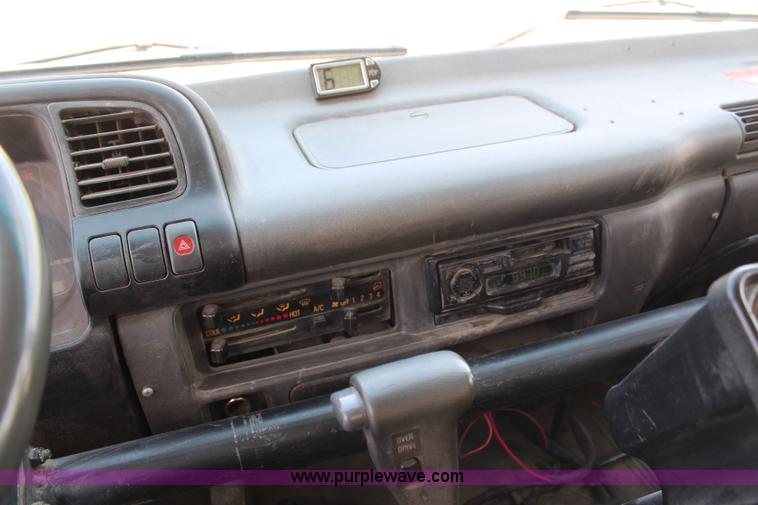 image for item H6735 2000 GMC 4500 sweeper truck