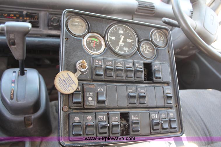 image for item H6735 2000 GMC 4500 sweeper truck