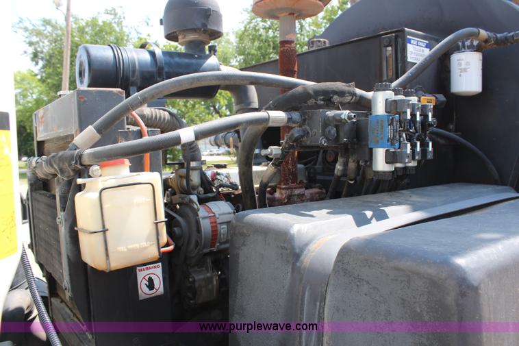 image for item H6735 2000 GMC 4500 sweeper truck