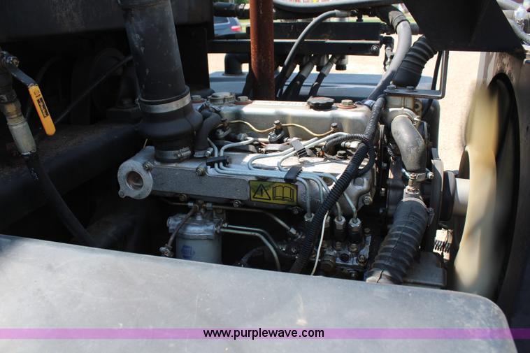 image for item H6735 2000 GMC 4500 sweeper truck