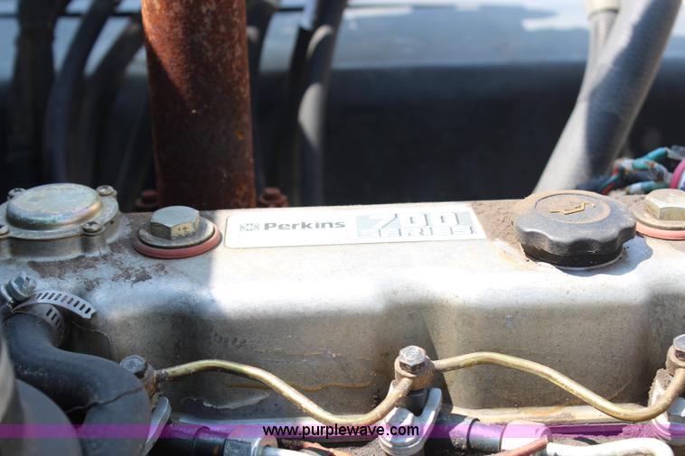 image for item H6735 2000 GMC 4500 sweeper truck