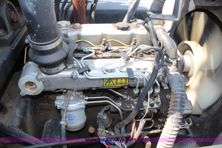 image for item H6735 2000 GMC 4500 sweeper truck