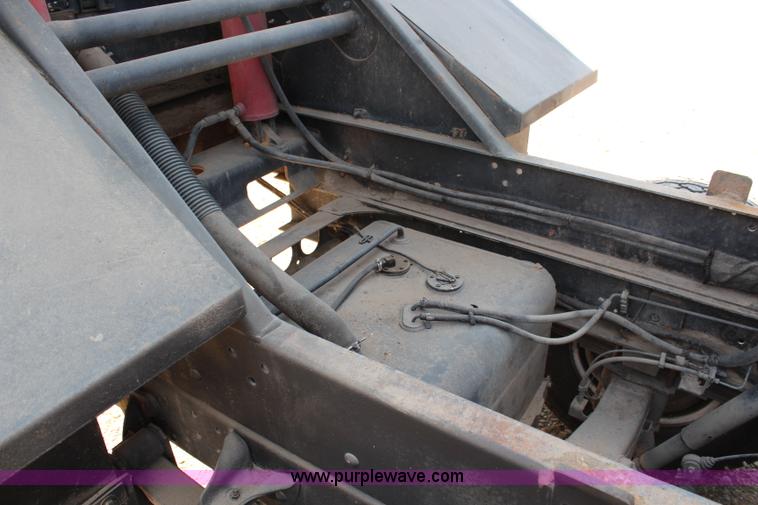 image for item H6735 2000 GMC 4500 sweeper truck