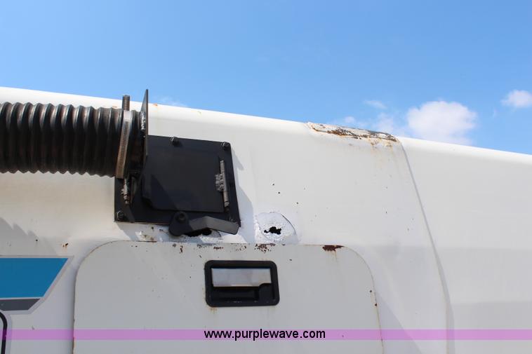 image for item H6735 2000 GMC 4500 sweeper truck