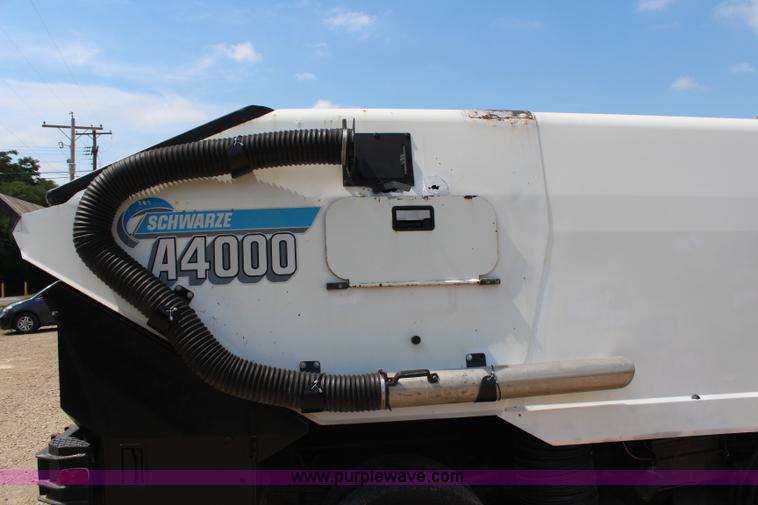 image for item H6735 2000 GMC 4500 sweeper truck