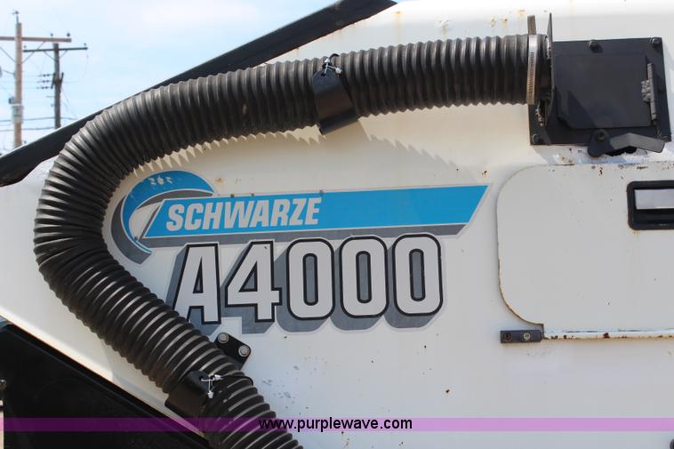 image for item H6735 2000 GMC 4500 sweeper truck