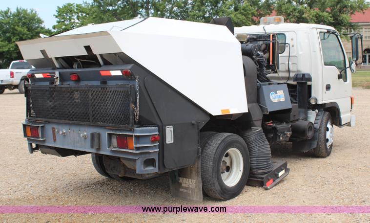 image for item H6736 1999 Isuzu NPR sweeper truck