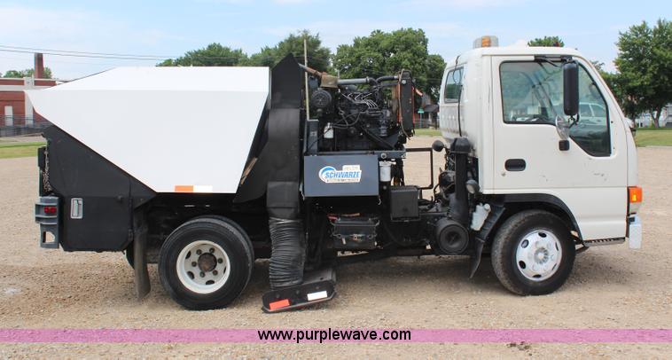 image for item H6736 1999 Isuzu NPR sweeper truck